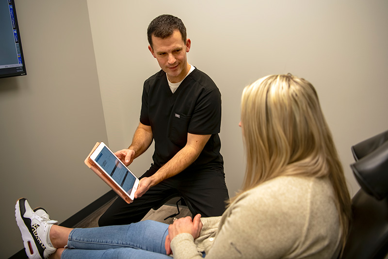 dr sean hershberger speaking with a patient